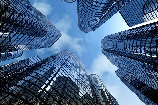 skyscrapers reflecting each other on their windows